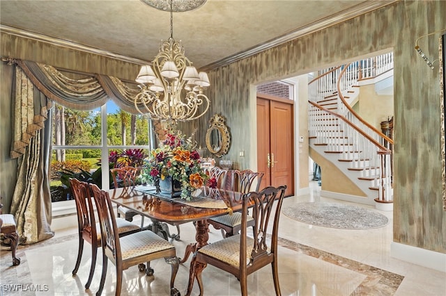 dining room with stairway, a notable chandelier, marble finish floor, and crown molding