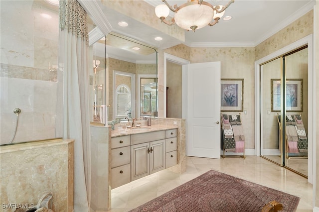 full bath featuring vanity, a shower with curtain, baseboards, crown molding, and a chandelier