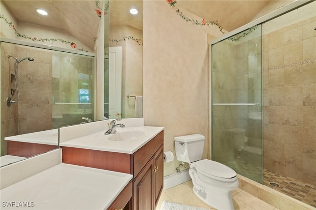 full bathroom with toilet, a stall shower, vanity, and tile patterned flooring