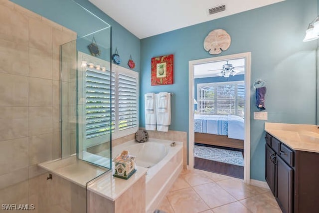 ensuite bathroom with visible vents, a tile shower, tile patterned flooring, a garden tub, and connected bathroom