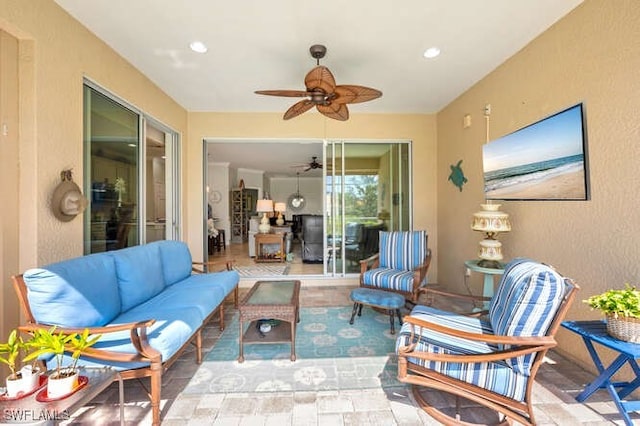 view of patio / terrace featuring an outdoor living space and ceiling fan