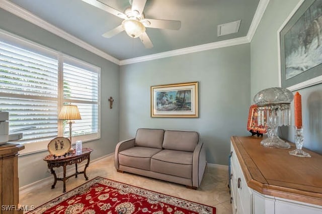 living area with visible vents, ornamental molding, light tile patterned flooring, baseboards, and ceiling fan