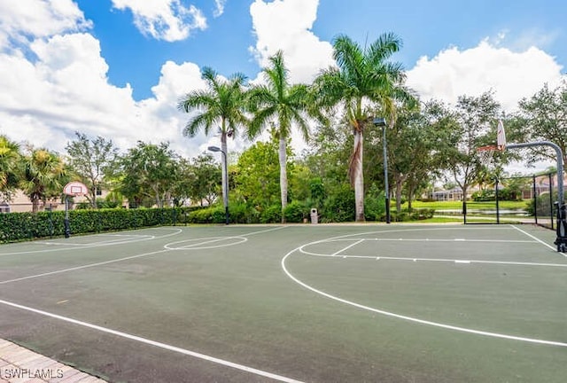 view of sport court with community basketball court and fence