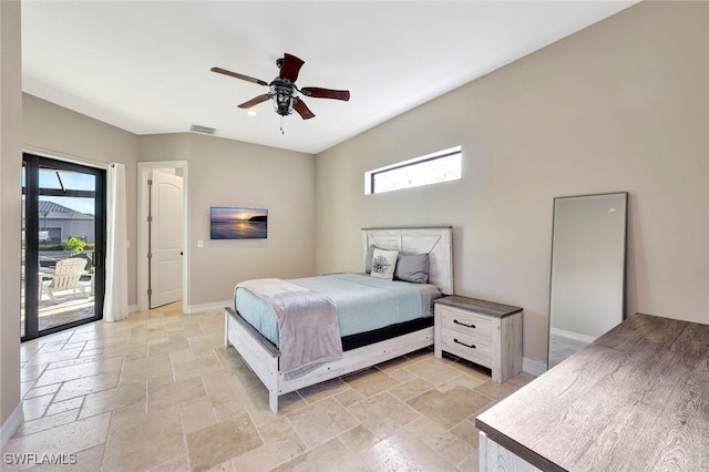 bedroom featuring access to exterior, stone tile floors, baseboards, and visible vents