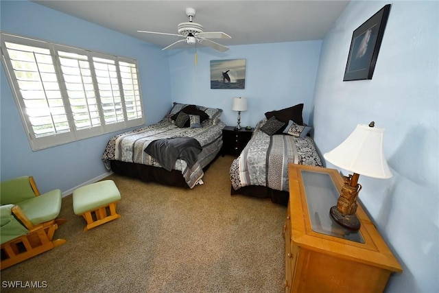 bedroom featuring carpet and ceiling fan