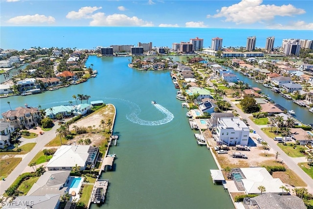 bird's eye view with a water view