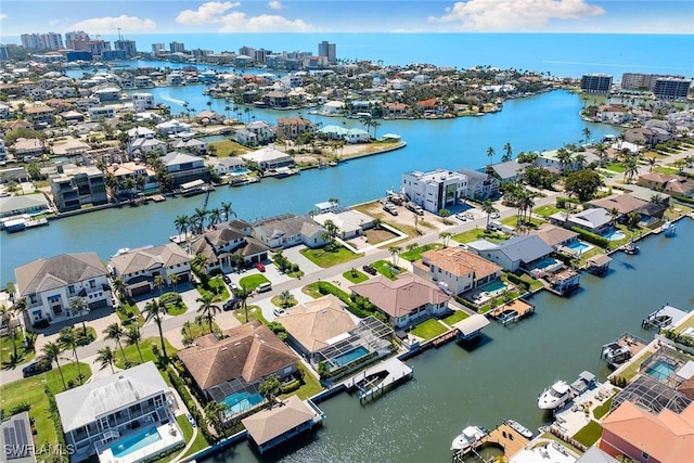 bird's eye view with a water view and a city view