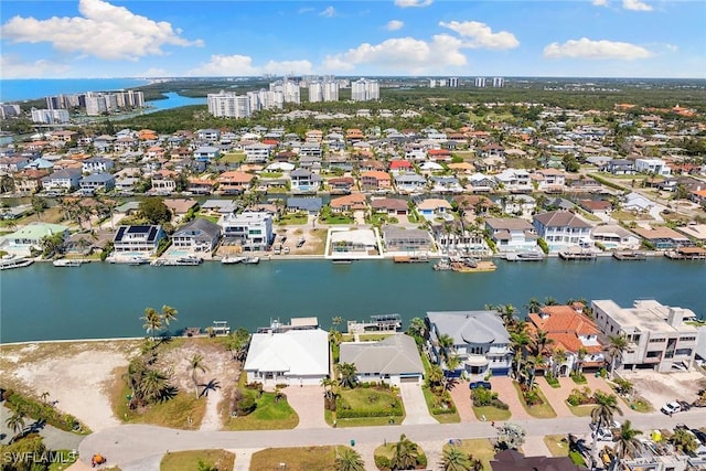 drone / aerial view featuring a water view