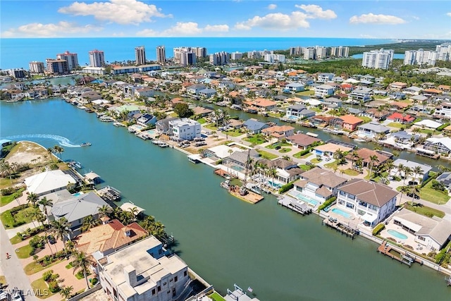 aerial view with a view of city and a water view