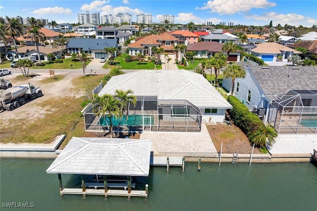 aerial view featuring a residential view and a water view