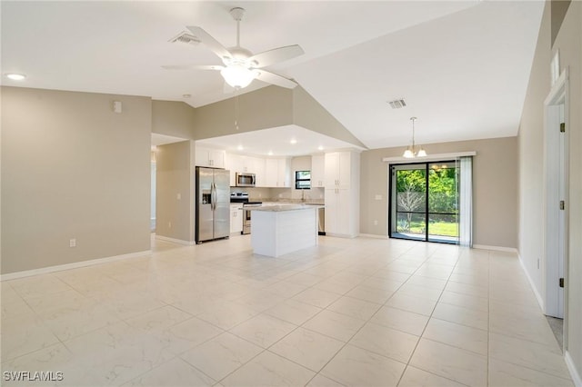 unfurnished living room with a ceiling fan, baseboards, visible vents, recessed lighting, and vaulted ceiling