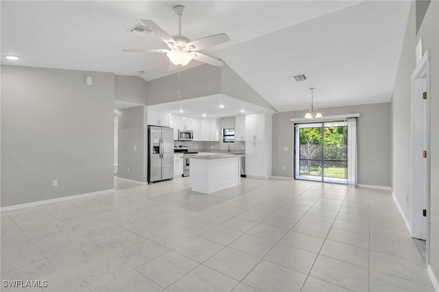 unfurnished living room featuring baseboards, vaulted ceiling, recessed lighting, a ceiling fan, and visible vents