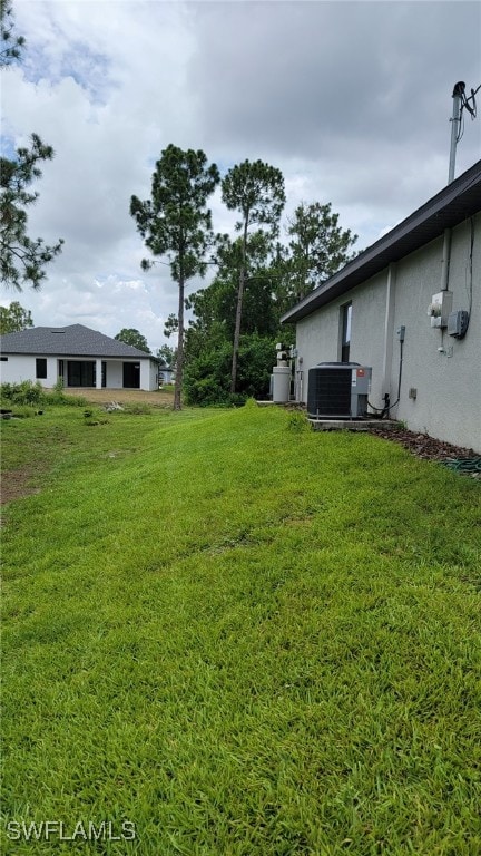 5303 4th St W, Lehigh Acres, FL 33971 - view of grassy yard