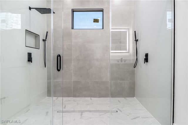 full bathroom with a shower stall