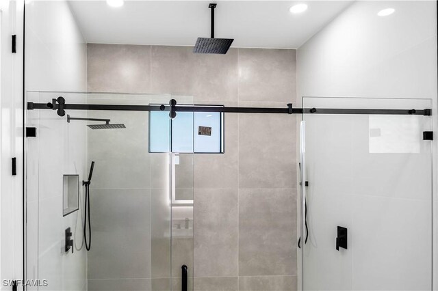 full bath with recessed lighting and a stall shower