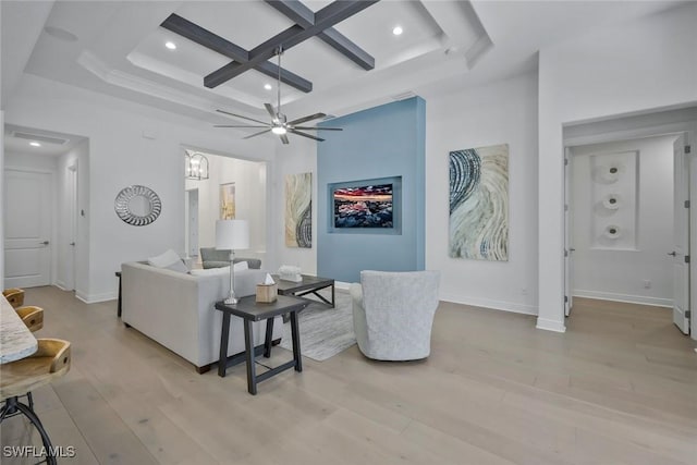 10111 Palazzo Dr, Naples, FL 34119 - living area with coffered ceiling, recessed lighting, wood finished floors, beamed ceiling, and baseboards