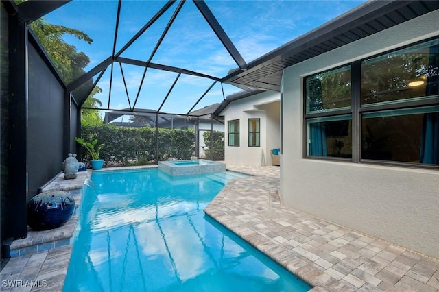 10111 Palazzo Dr, Naples, FL 34119 - view of pool with a patio area, a pool with connected hot tub, and glass enclosure