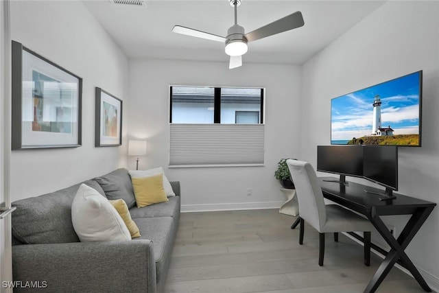 10111 Palazzo Dr, Naples, FL 34119 - office area with a ceiling fan, wood finished floors, and baseboards