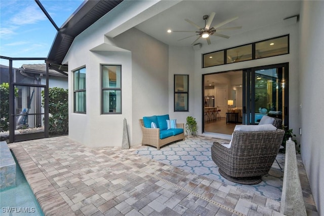 10111 Palazzo Dr, Naples, FL 34119 - view of patio featuring ceiling fan and a lanai