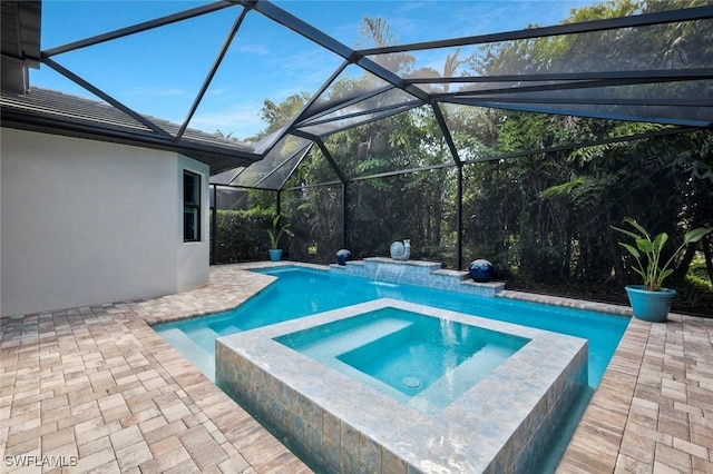 10111 Palazzo Dr, Naples, FL 34119 - view of pool featuring a patio, a lanai, and a pool with connected hot tub