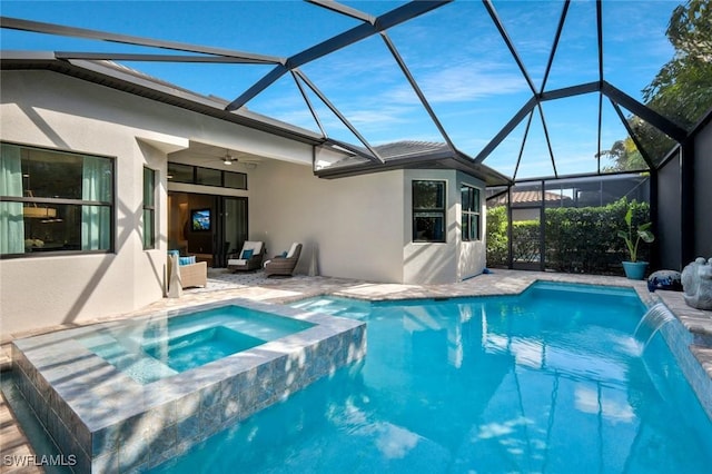 10111 Palazzo Dr, Naples, FL 34119 - view of swimming pool featuring ceiling fan, a patio area, a pool with connected hot tub, and glass enclosure