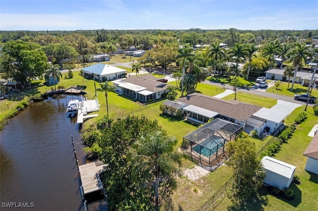 drone / aerial view with a water view