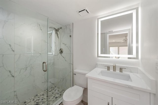 100 Estero Blvd Unit 131, Fort Myers Beach, FL 33931 - full bathroom with toilet, a marble finish shower, and vanity