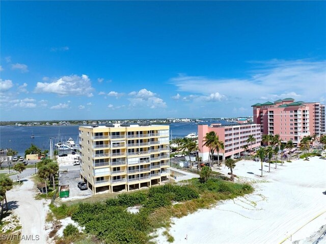 exterior space with a view of city and a water view