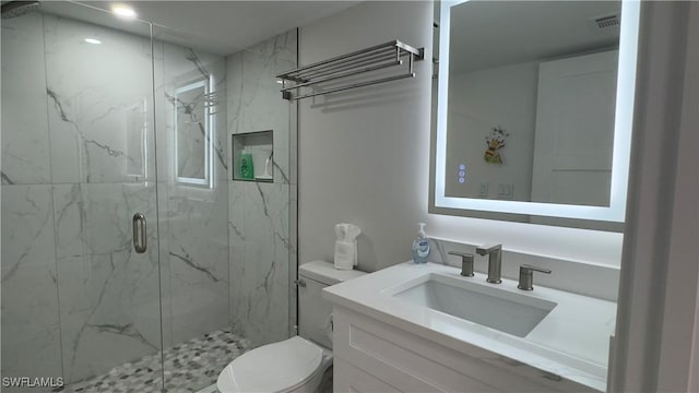 100 Estero Blvd Unit 131, Fort Myers Beach, FL 33931 - bathroom featuring toilet, a marble finish shower, vanity, and recessed lighting