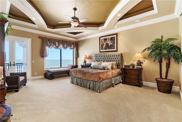 bedroom featuring baseboards, a tray ceiling, access to exterior, french doors, and carpet flooring