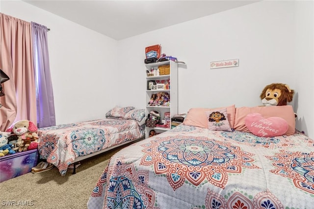 bedroom featuring carpet