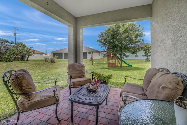 view of patio with a playground