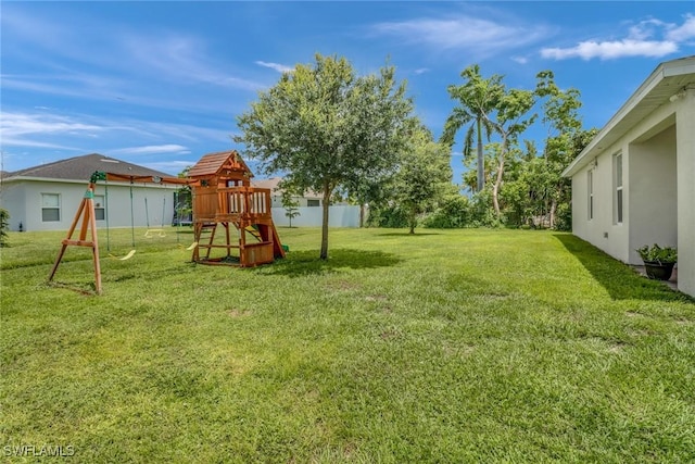 view of yard with a playground