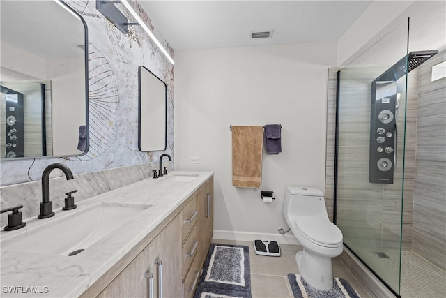 full bathroom featuring a sink, visible vents, toilet, and a tile shower