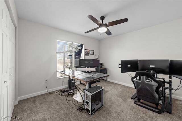 office with baseboards, a ceiling fan, and carpet flooring