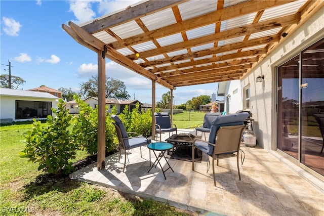 view of patio featuring an outdoor fire pit