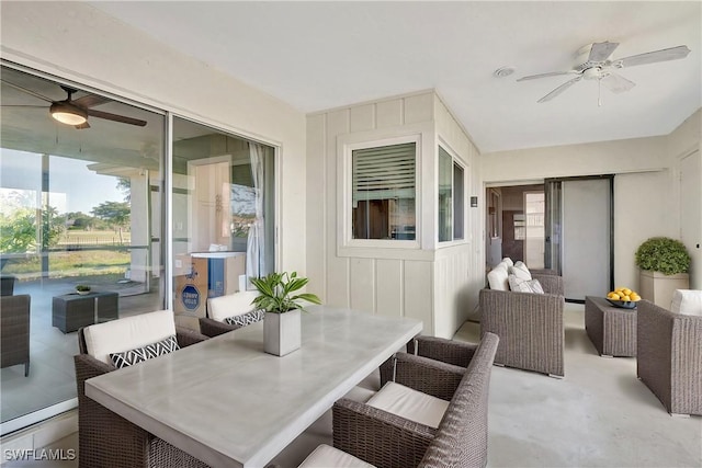 sunroom / solarium with ceiling fan