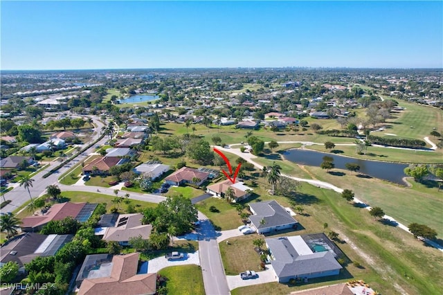 aerial view featuring a water view and a residential view