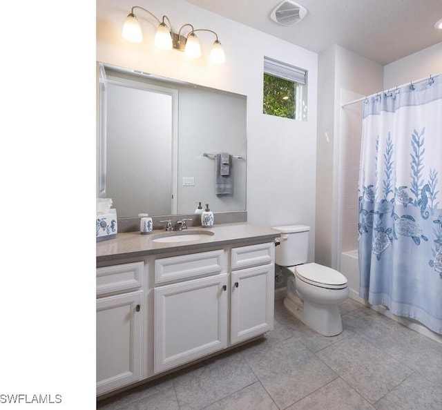 bathroom featuring tile patterned flooring, visible vents, toilet, shower / tub combo, and vanity