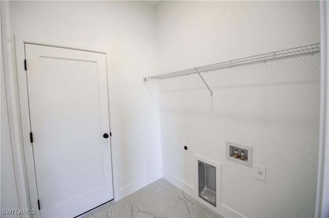 clothes washing area with baseboards, laundry area, hookup for a washing machine, marble finish floor, and hookup for an electric dryer