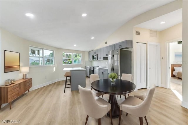 dining area with recessed lighting, visible vents, light wood finished floors, and baseboards