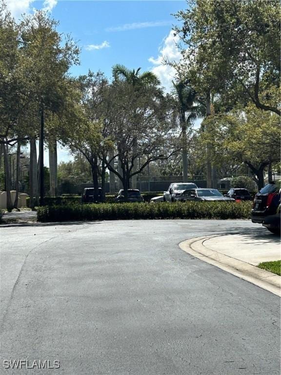 view of road featuring curbs and sidewalks