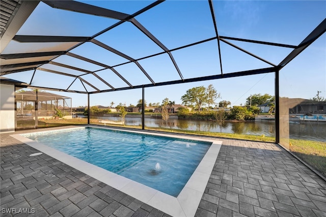 310 SW 31st Ter, Cape Coral, FL 33914 - pool featuring a water view, a lanai, and a patio area