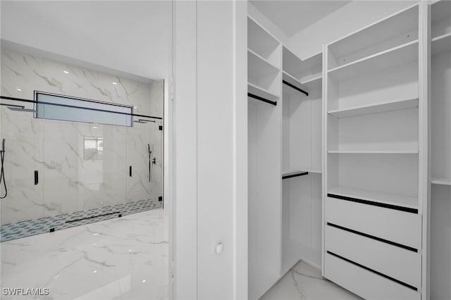 310 SW 31st Ter, Cape Coral, FL 33914 - walk in closet featuring marble finish floor
