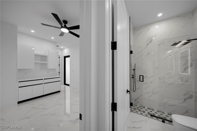 310 SW 31st Ter, Cape Coral, FL 33914 - bathroom with a marble finish shower, recessed lighting, marble finish floor, and ceiling fan