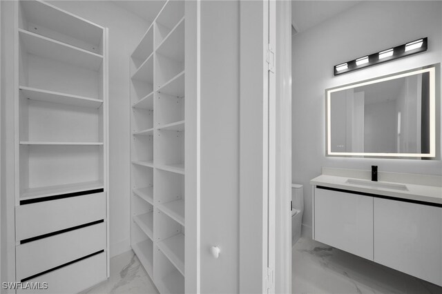 310 SW 31st Ter, Cape Coral, FL 33914 - interior space with a sink and marble finish floor