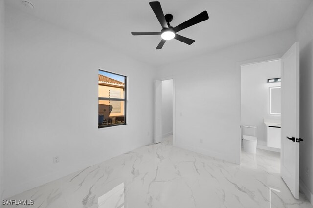 310 SW 31st Ter, Cape Coral, FL 33914 - unfurnished room featuring a ceiling fan and marble finish floor