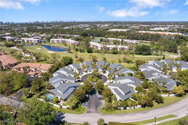 aerial view featuring a residential view and a water view