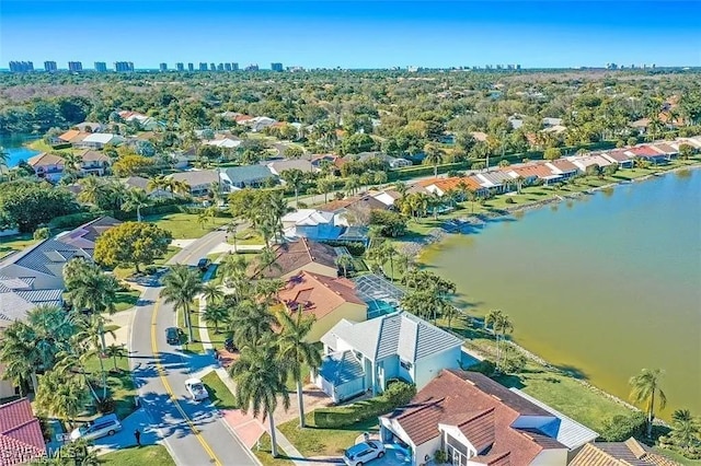 aerial view with a residential view and a water view