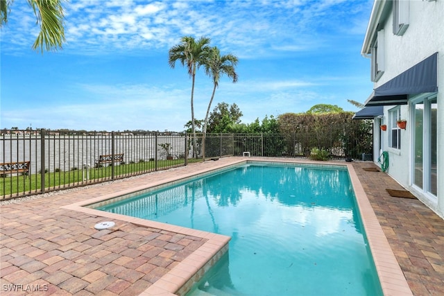 view of pool with a patio area, a fenced backyard, and a fenced in pool